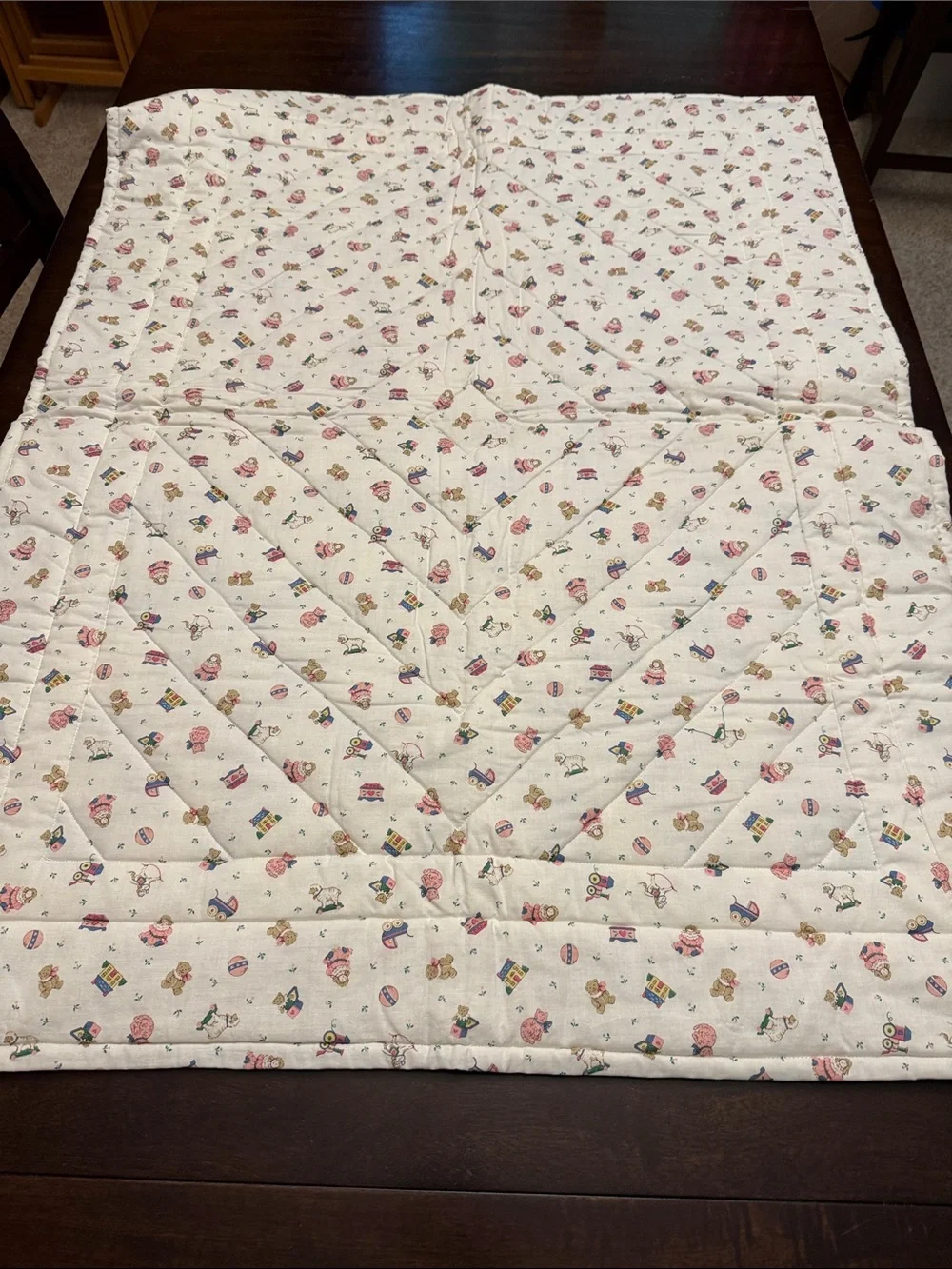 Quilted baby blanket.